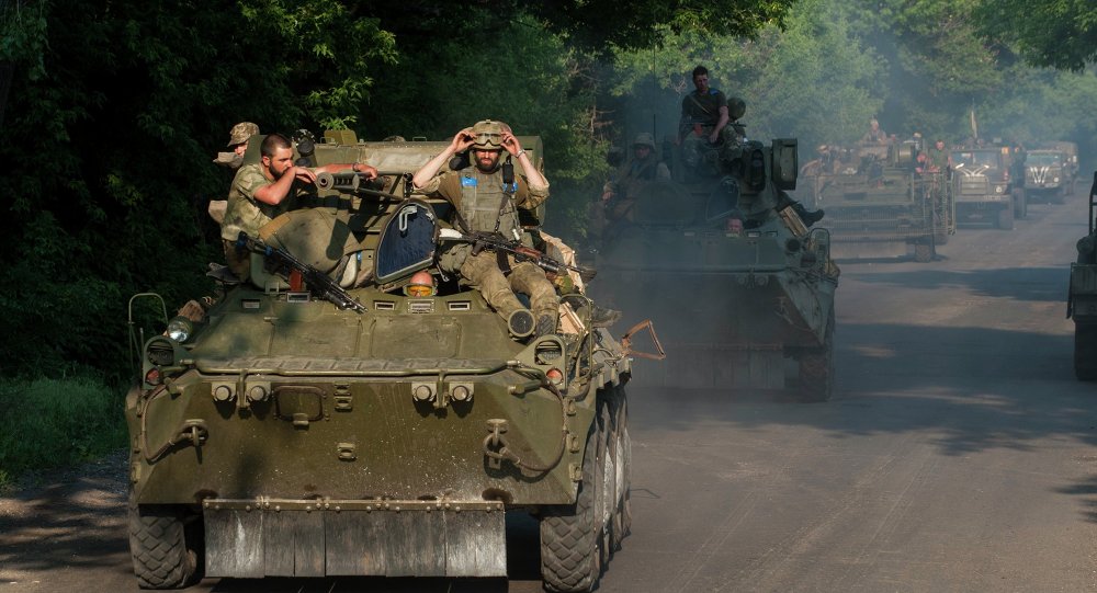 Kiev và phe ly khai đồng ý không để Ukraine chia cắt ảnh 2